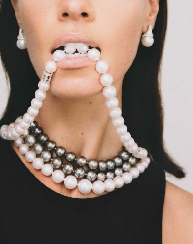 The Row top ($320), Saks Fifth Avenue, The Gardens Mall, Palm Beach Gardens; 18-karat white gold South Sea pearl and diamond earrings ($9,500), 14-karat white gold 34-inch gray ombré South Sea pearl necklace ($15,600), 14-karat white gold 36-inch South Sea and pink freshwater pearl necklace ($10,800), 18-karat white gold South Sea cultured pearl diamond necklace ($22,000), Hamilton Jewelers, The Gardens Mall, Palm Beach Gardens