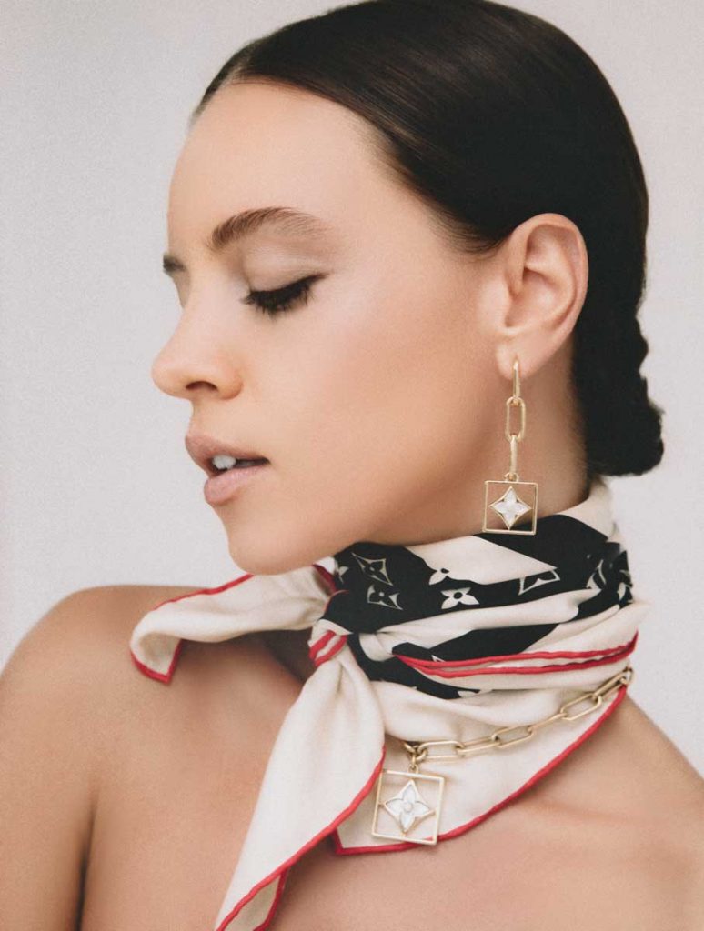 Monogram Frame square 70 scarf ($370), B Blossom 18-karat yellow gold earrings with white mother-of-pearl and diamonds (price upon request) and 18-karat yellow gold necklace with white mother-of-pearl and diamonds (price upon request), Louis Vuitton, The Gardens Mall, Palm Beach Gardens