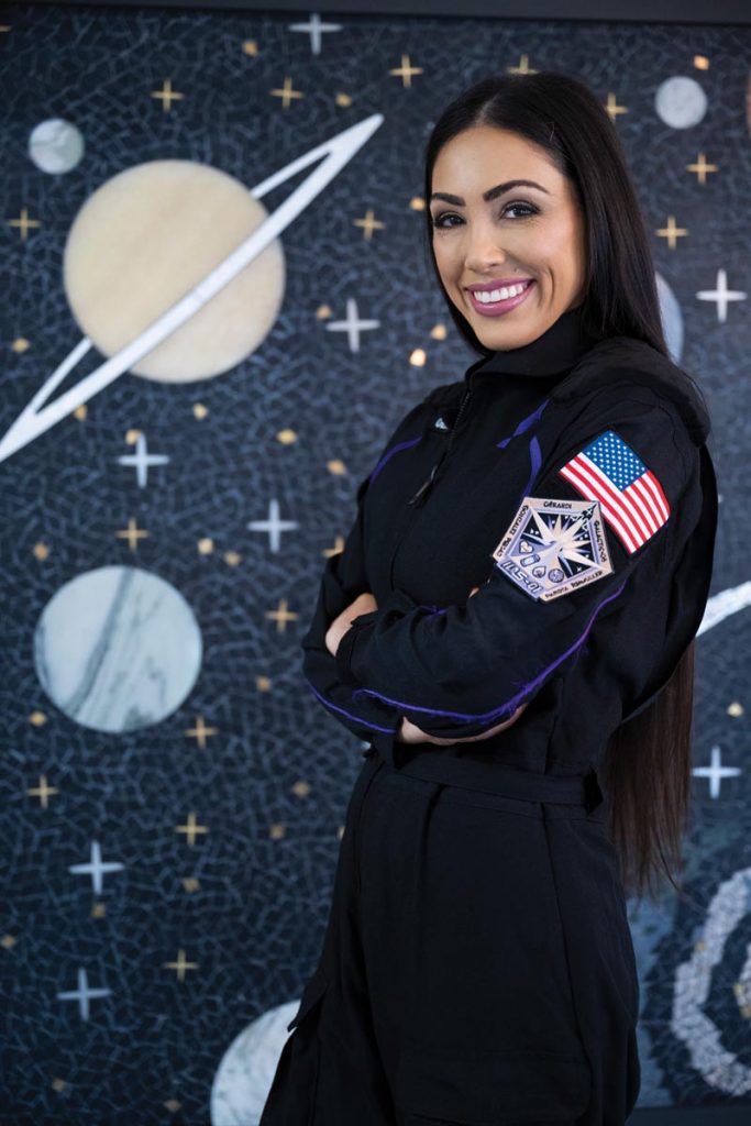 Kellie Gerardi in her official Virgin Galactic space suit. Photo by Steven Martine