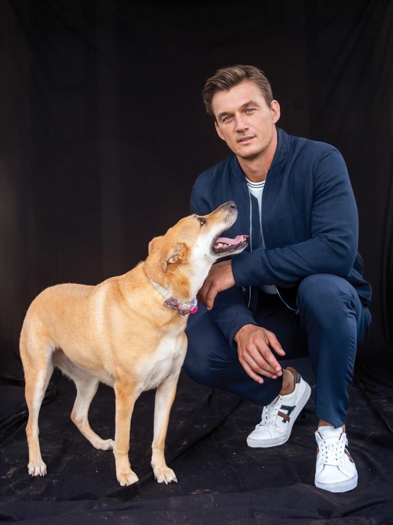 Cameron and his rescue dog, Harley. Photo by Scott Teitler
