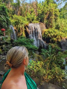 Hudzik takes in a waterfall in Bali. Photo courtesy of Debbie Hudzik