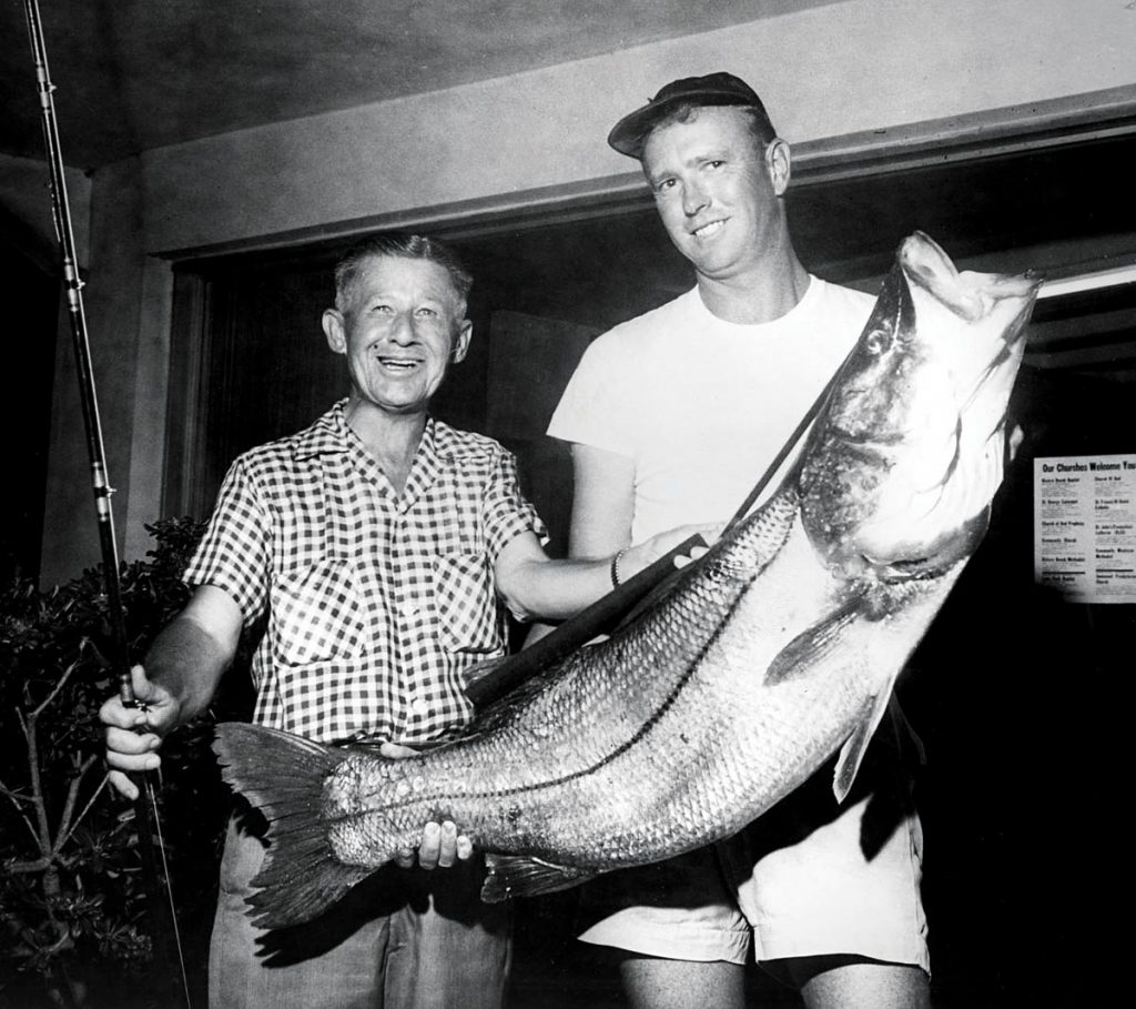 Jim Branch (right) with a 43-pound snook he caught locally back in 1958. Photo courtesy of West Palm Beach Fishing Club