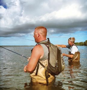 Jimmy Dean (left) and Skip Dean wade-fish a Stuart flat for snook. Photo by George LaBonte