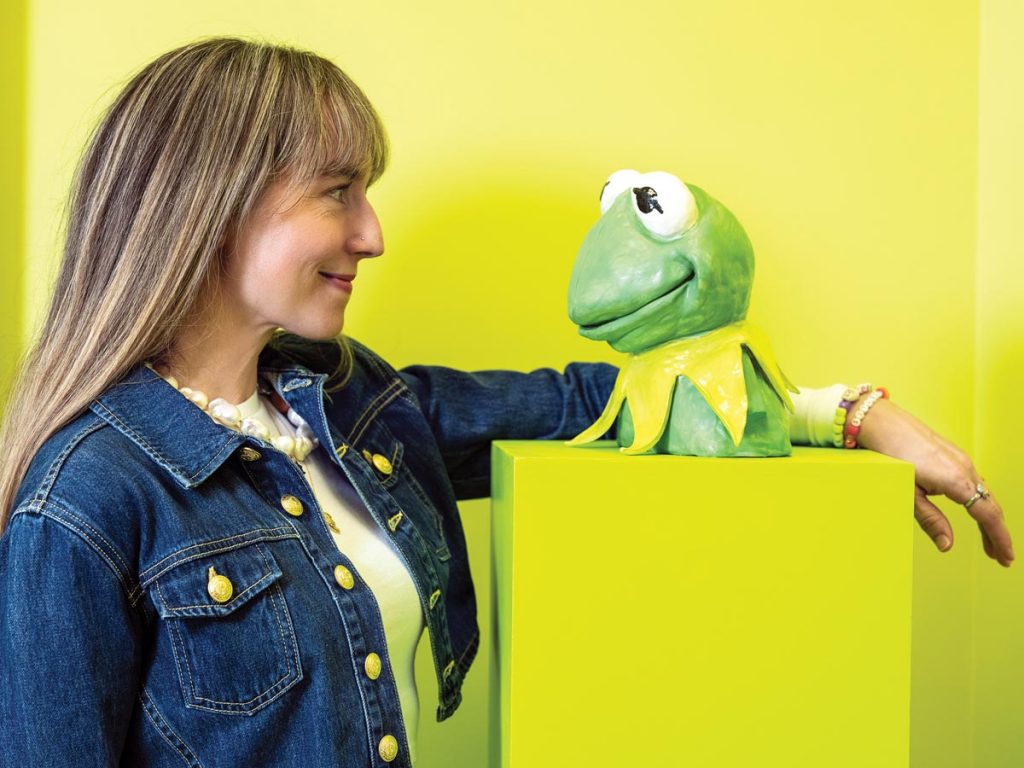 Going green with a sculpture Newsted made of Kermit the Frog. Photo by Benjamin Rusnak