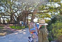 Celebrate 13 Years of the Plein Air Festival Artist Kari Ganoung-Ruiz paints at the Paint Out Competition at Jupiter Inlet Lighthouse & Museum. Photo courtesy of Lighthouse ArtCenter