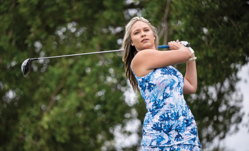 Gabi Powel takes a swing. Photo by Steven Martine